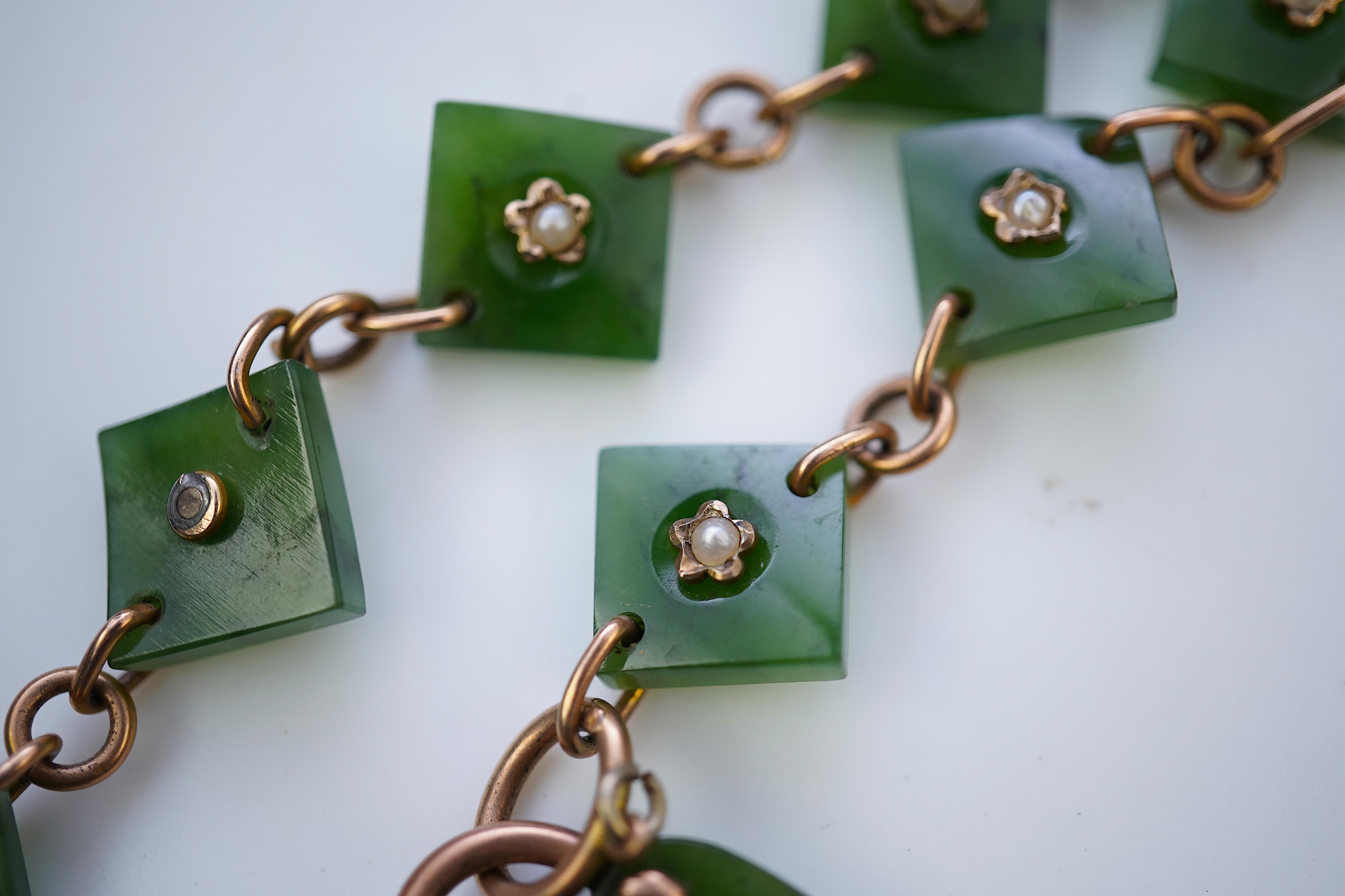 A nephrite and seed pearl bracelet, circa 1900
